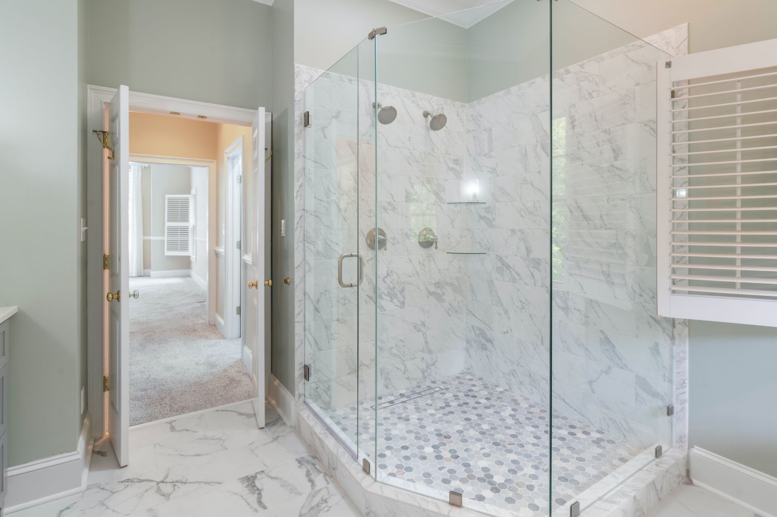 Sparkling Secrets: How Hotels Keep Glass Shower Doors Spotless